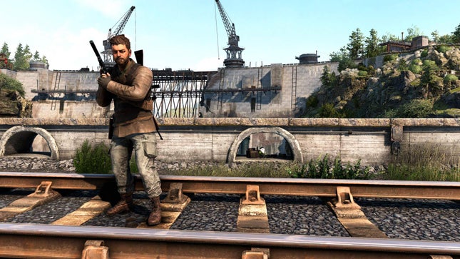 The protagonist of Sniper Elite: Resistance is on trace traces, while the French resistance noma is in the background.